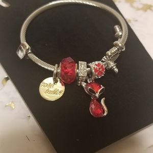 Charm bracelet with red details
